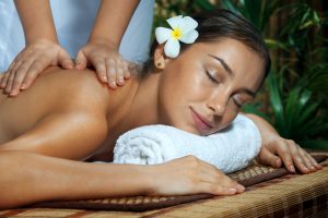 portrait of young beautiful woman in spa environment